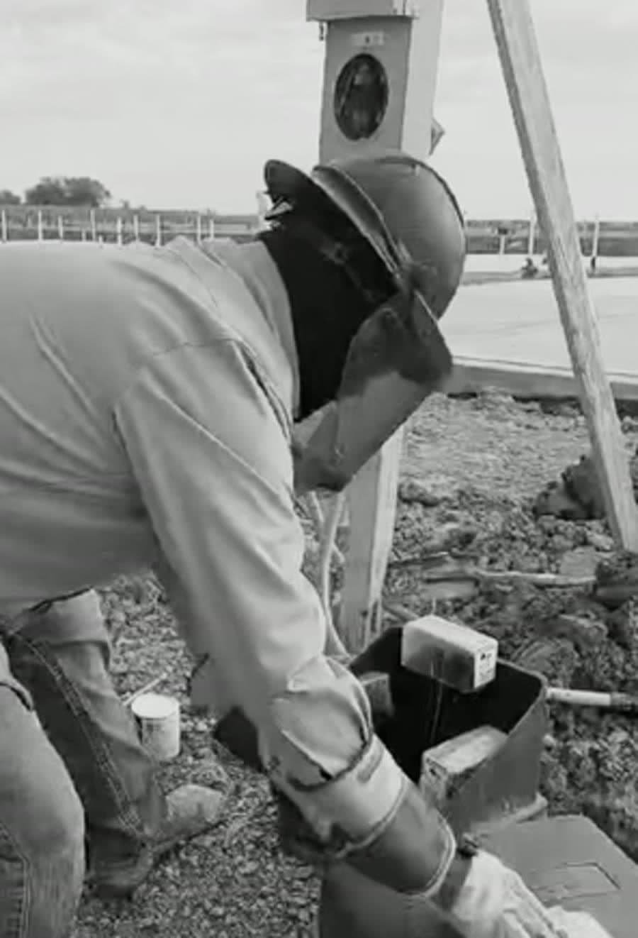 Field technician completing a pedestal change-out.